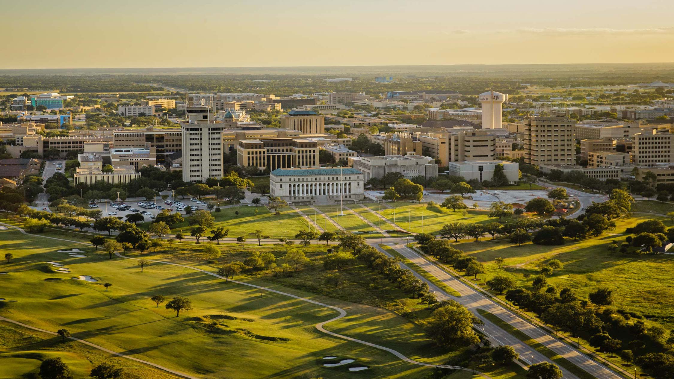 An aerial view of the Texas A&M University campus during golden hour